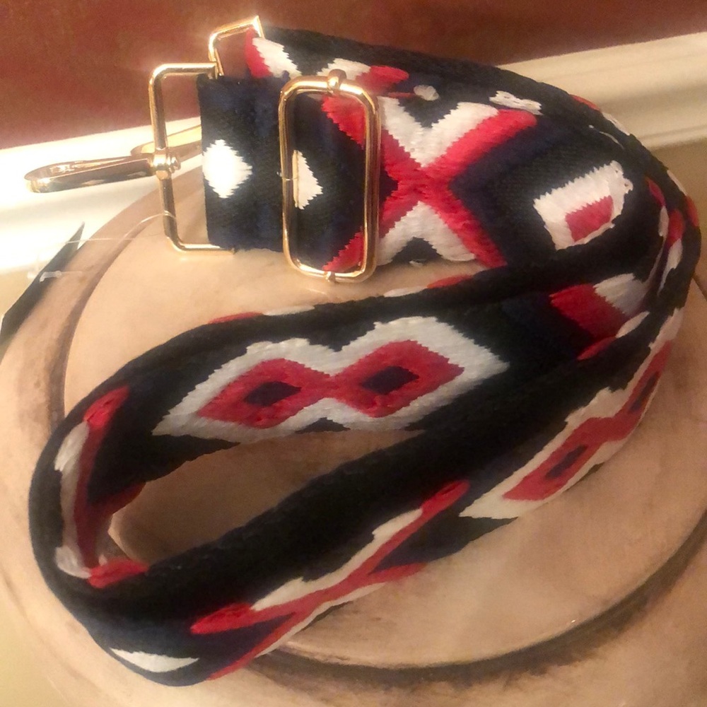 Adjustable strap NWT extends to 52 inches